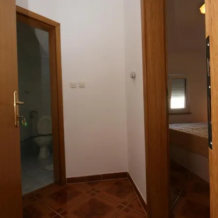 Apartments And Rooms By The Sea Pag - 6311